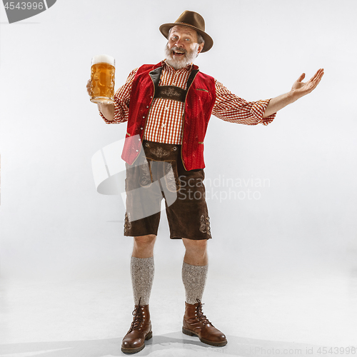 Image of Portrait of Oktoberfest man, wearing the traditional Bavarian clothes