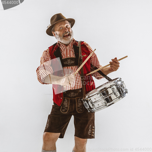 Image of Portrait of Oktoberfest man, wearing the traditional Bavarian clothes