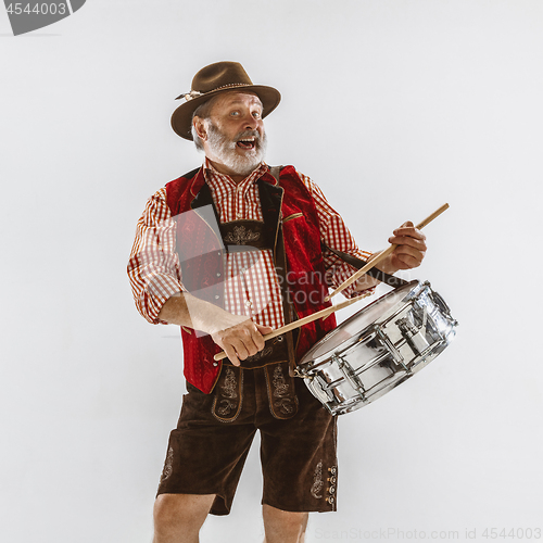 Image of Portrait of Oktoberfest man, wearing the traditional Bavarian clothes