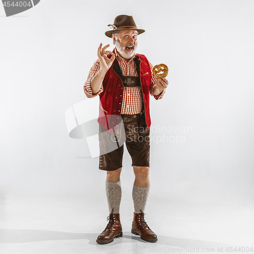 Image of Portrait of Oktoberfest man, wearing the traditional Bavarian clothes