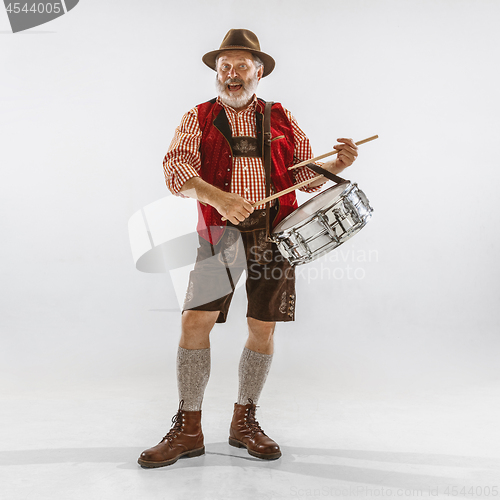 Image of Portrait of Oktoberfest man, wearing the traditional Bavarian clothes