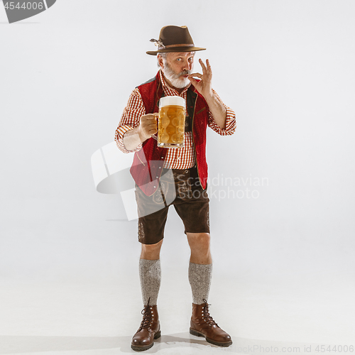 Image of Portrait of Oktoberfest man, wearing the traditional Bavarian clothes