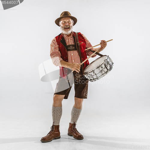 Image of Portrait of Oktoberfest man, wearing the traditional Bavarian clothes