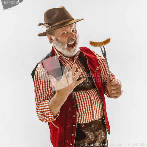 Image of Portrait of Oktoberfest man, wearing the traditional Bavarian clothes