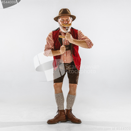 Image of Portrait of Oktoberfest man, wearing the traditional Bavarian clothes