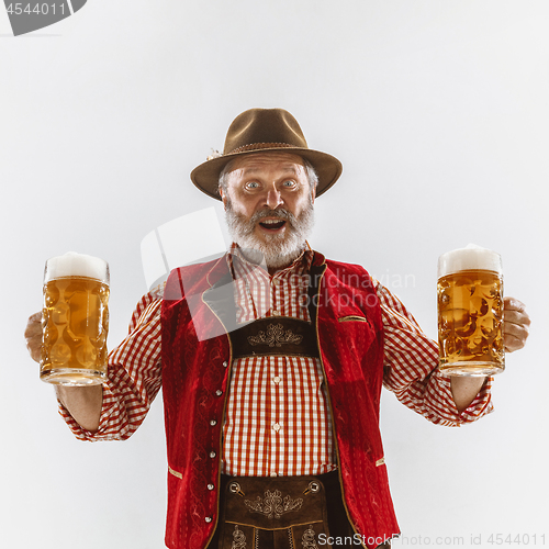 Image of Portrait of Oktoberfest man, wearing the traditional Bavarian clothes