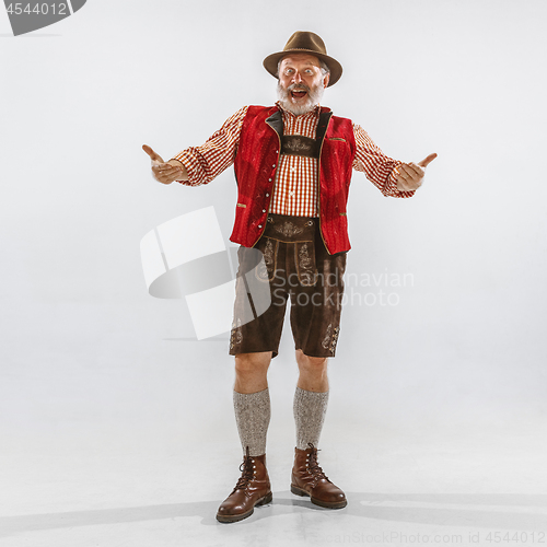 Image of Portrait of Oktoberfest man, wearing the traditional Bavarian clothes