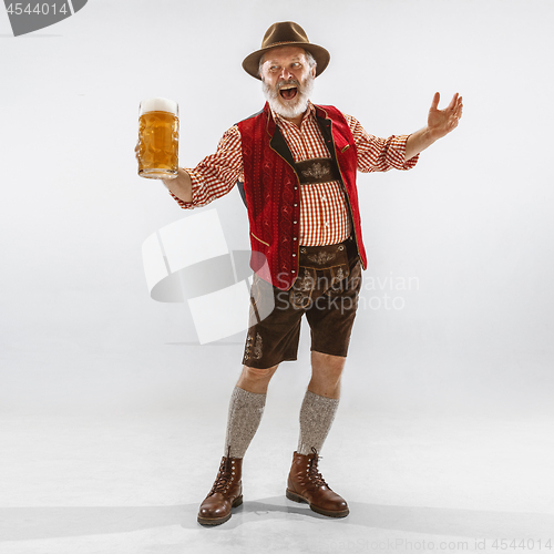 Image of Portrait of Oktoberfest man, wearing the traditional Bavarian clothes