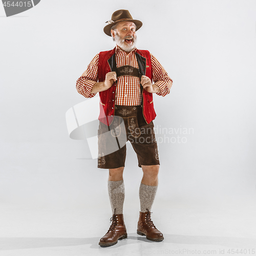 Image of Portrait of Oktoberfest man, wearing the traditional Bavarian clothes