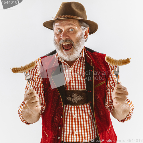 Image of Portrait of Oktoberfest man, wearing the traditional Bavarian clothes