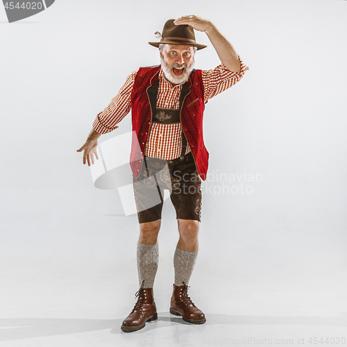 Image of Portrait of Oktoberfest man, wearing the traditional Bavarian clothes