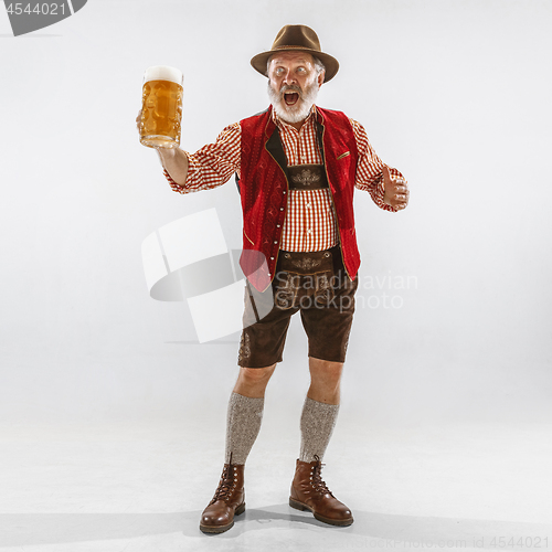 Image of Portrait of Oktoberfest man, wearing the traditional Bavarian clothes