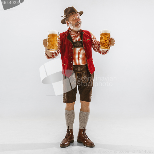 Image of Portrait of Oktoberfest man, wearing the traditional Bavarian clothes