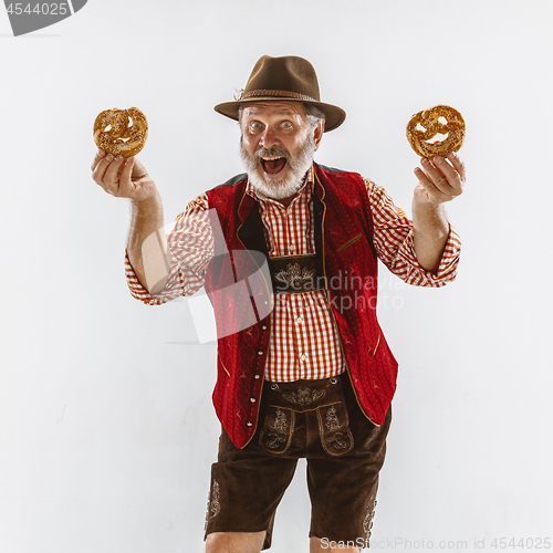 Image of Portrait of Oktoberfest man, wearing the traditional Bavarian clothes