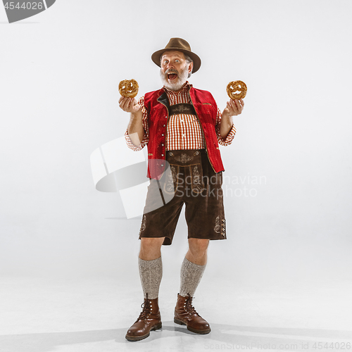 Image of Portrait of Oktoberfest man, wearing the traditional Bavarian clothes