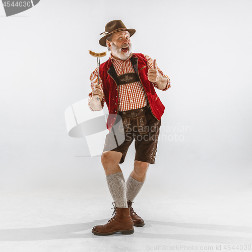 Image of Portrait of Oktoberfest man, wearing the traditional Bavarian clothes