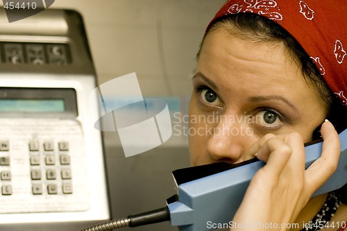 Image of girl having a call on a telephone