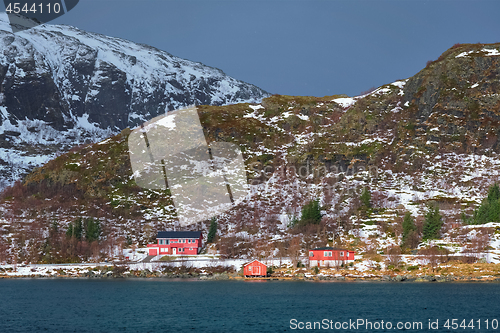 Image of Rd rorbu houses in Norway in winter