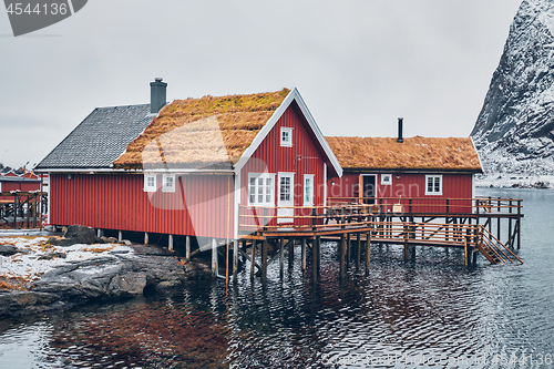 Image of Traditional red rorbu house in Reine village on Lofoten Islands,