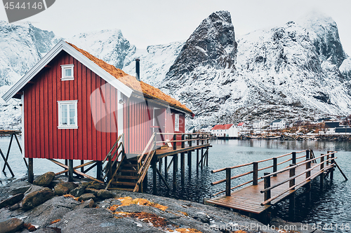 Image of Traditional red rorbu house in Reine village on Lofoten Islands,