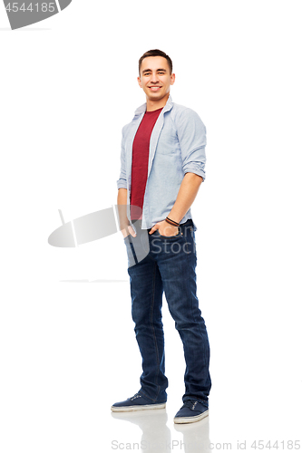 Image of smiling young man over white background