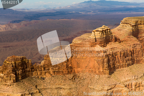 Image of aerial view of grand canyon cliffs from helicopter