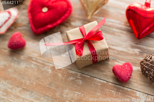 Image of close up of christmas gift and decorations