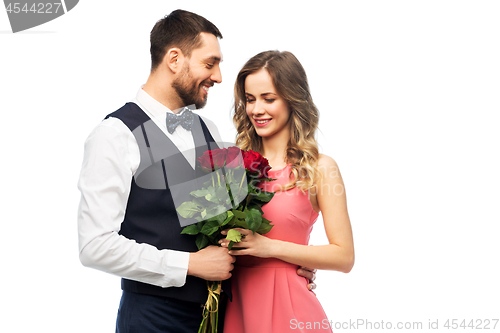 Image of couple with bunch of flowers on valentines day