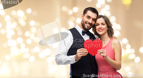 Image of happy couple with red heart on valentines day