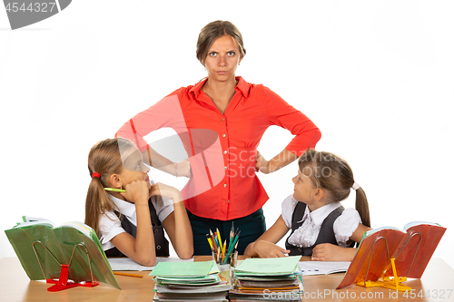 Image of Children look at an evil teacher