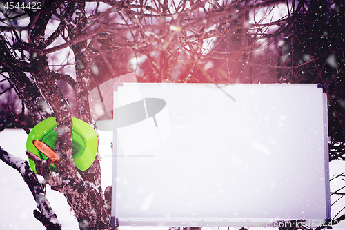 Image of whiteboard on winter tree