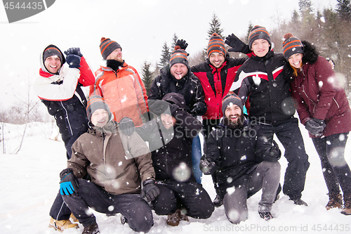 Image of portrait of group young people in beautiful winter landscape