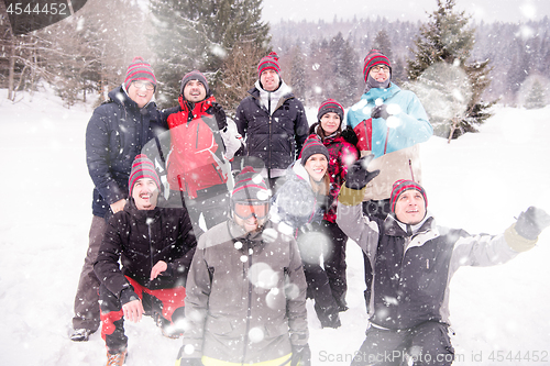 Image of portrait of group young people in beautiful winter landscape