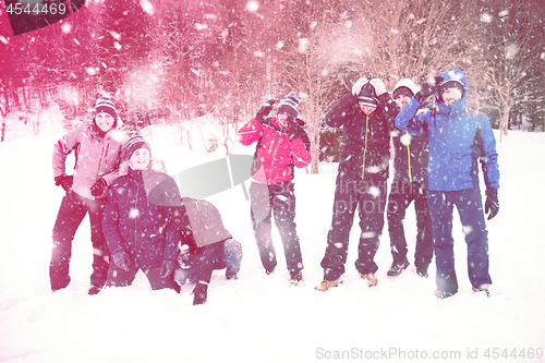 Image of portrait of group young people in beautiful winter landscape