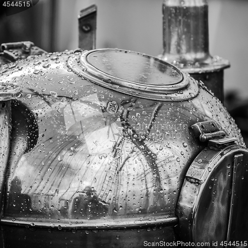 Image of Reflection of a mast in an old ship compass, closeup. Black and 