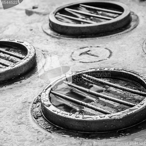 Image of Brass porthole of an old sailboat, close-up