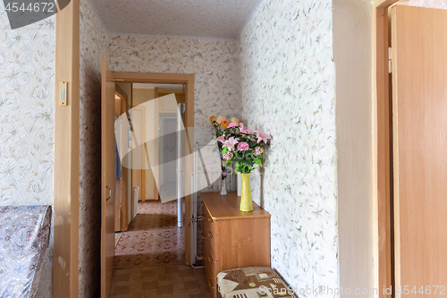 Image of Corridor of a three-room apartment with an outdated interior