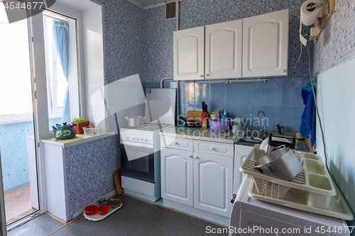 Image of The interior of the old kitchen with access to the balcony