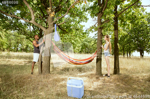 Image of Young multiethnic international couple outdoors