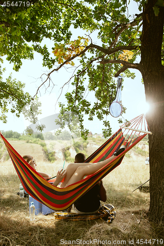 Image of Young multiethnic international couple outdoors