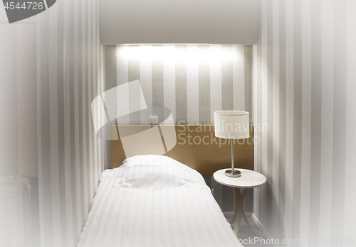 Image of Simple hotel room, single bed