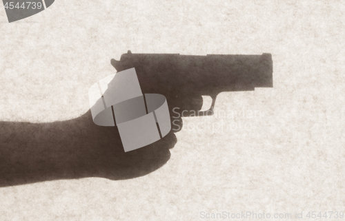 Image of Silhouette behind a transparent paper