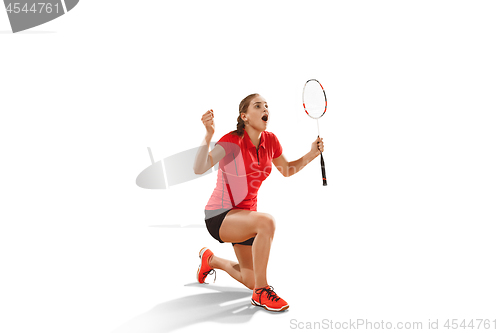 Image of Young woman badminton player as winner posing over white background