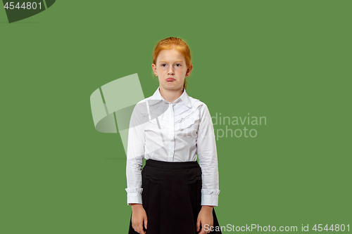 Image of Young serious thoughtful teen girl. Doubt concept.