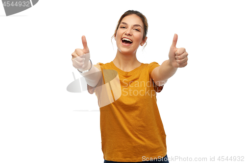 Image of woman or teenage girl in t-shirt showing thumbs up