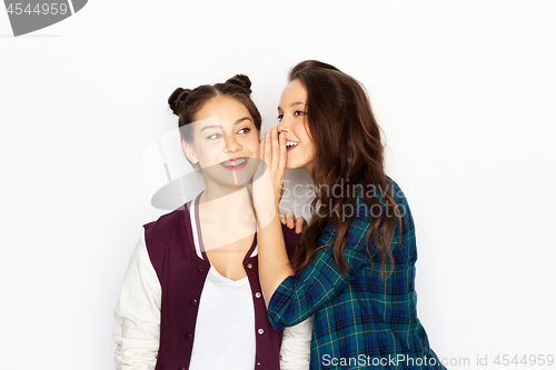 Image of teenage girls gossiping or sharing secrets