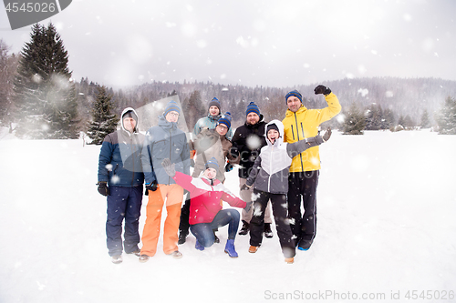 Image of portrait of group young people in beautiful winter landscape