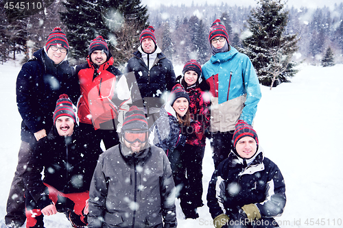 Image of portrait of group young people in beautiful winter landscape