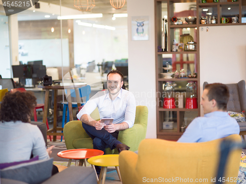 Image of Startup Business Team At A Meeting at modern office building