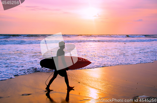 Image of Surfer at Balinese beach, Indonesia